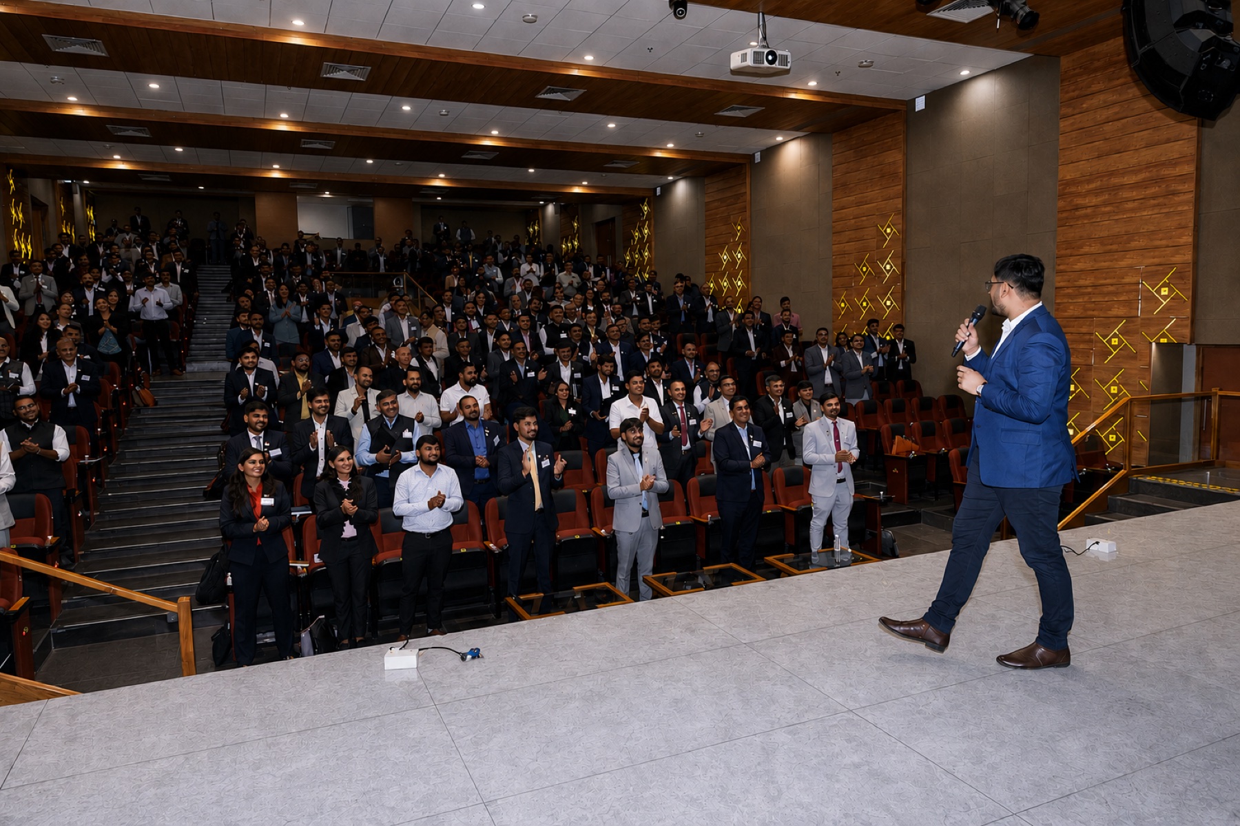 Upendrasinh Zala speaking on stage