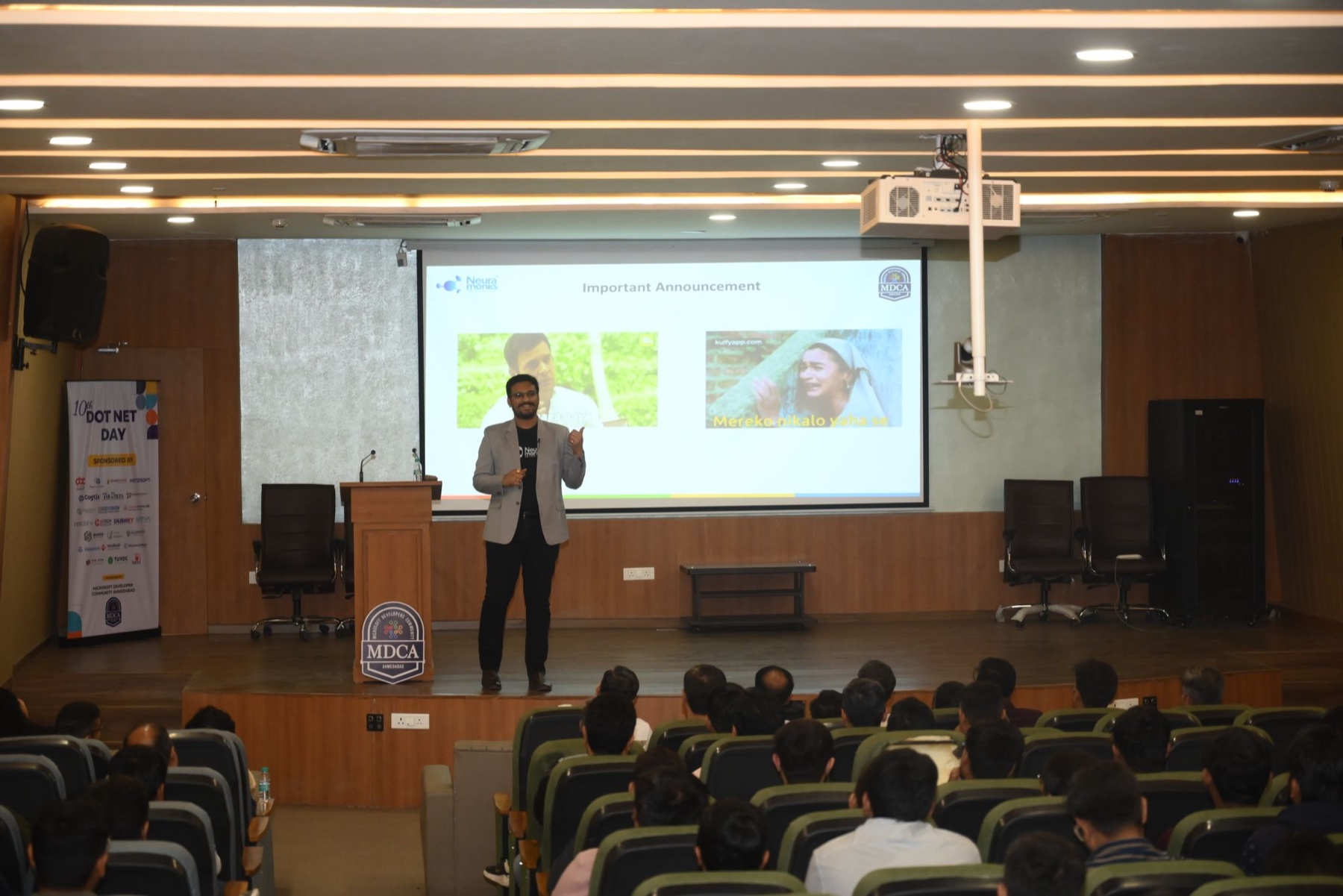 Upendrasinh Zala speaking on stage